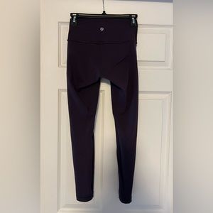 Lululemon plum/purple colored leggings. Size 4.